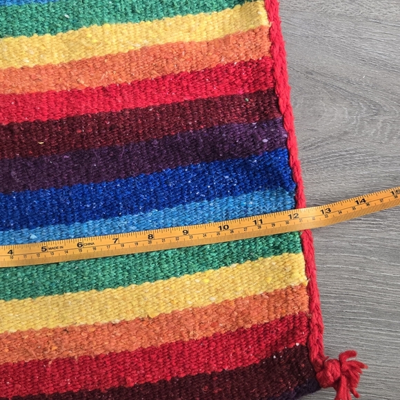 Woven rainbow satchel with a red strap and trim. - Picture 6 of 8